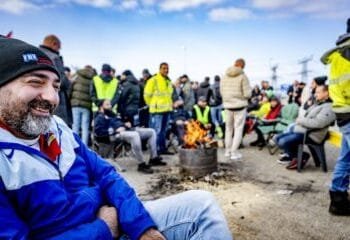 Dock workers end their strike at Rotterdam port, pay deal agreed