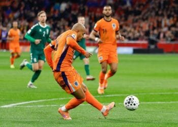 Rapid-fire Oranje reach World Cup with 4-0 win over Lithuania
